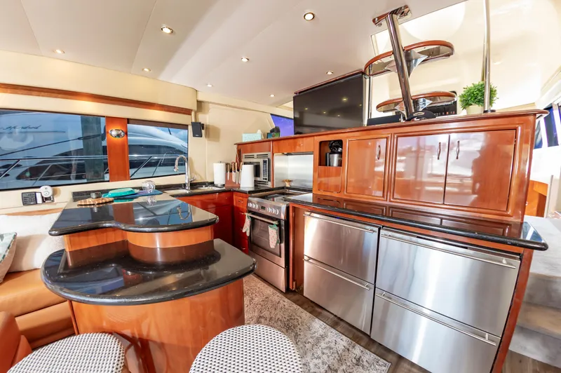 Slide: The Image of Luxurious kitchen interior of 2004 Carver 56 Voyager SE yacht with modern appliances. - 3