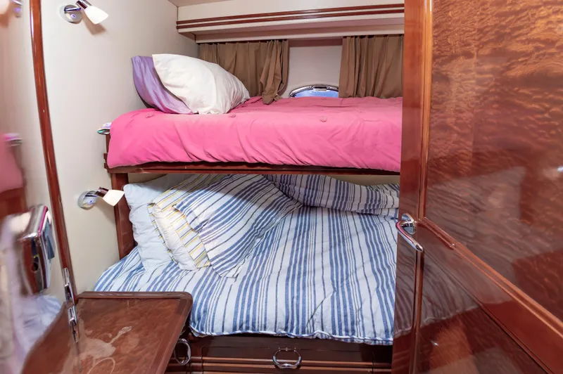 Slide: The Image of Bunk beds in the 2004 Carver 56 Voyager SE yacht cabin. - 31