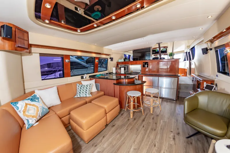 Slide: The Image of Luxurious interior of a 2004 Carver 56 Voyager SE yacht with modern furnishings. - 4