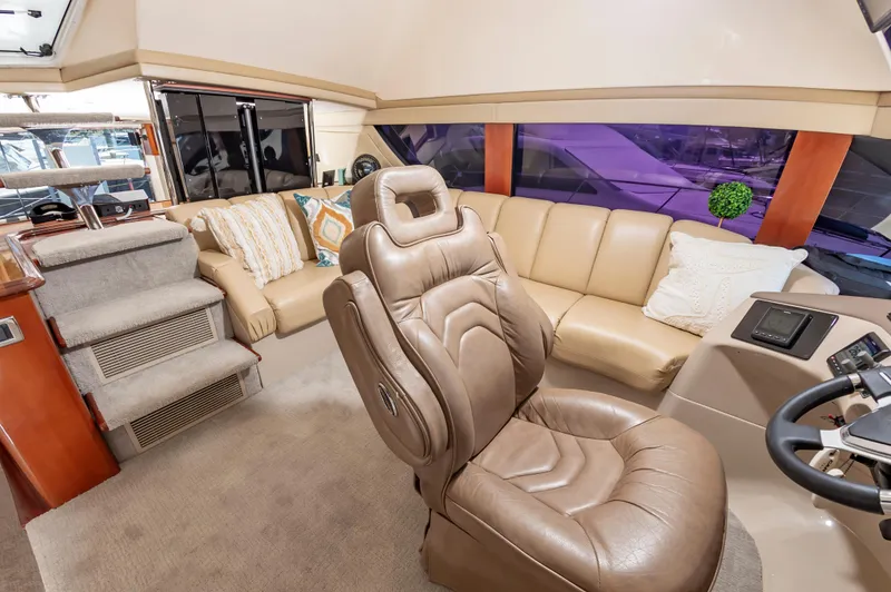 Slide: The Image of Luxurious interior of 2004 Carver 56 Voyager SE yacht with leather seating and modern design. - 9