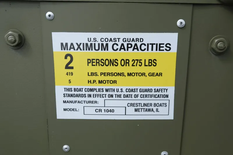 Slide: The Image of 2024 Crestliner 1040 CR Jon boat capacity label, 2 persons or 275 lbs, 5 HP motor. - 4