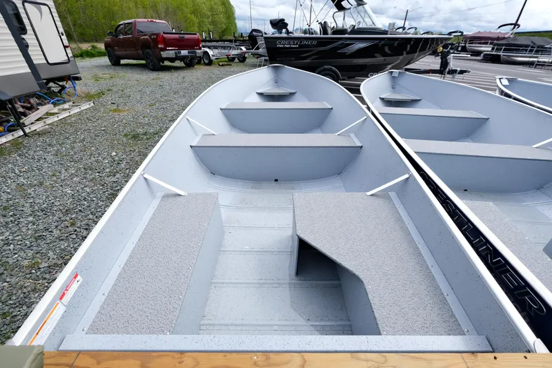 Slide: The Image of 2024 Crestliner 1672 Outreach aluminum fishing boat on display. - 2