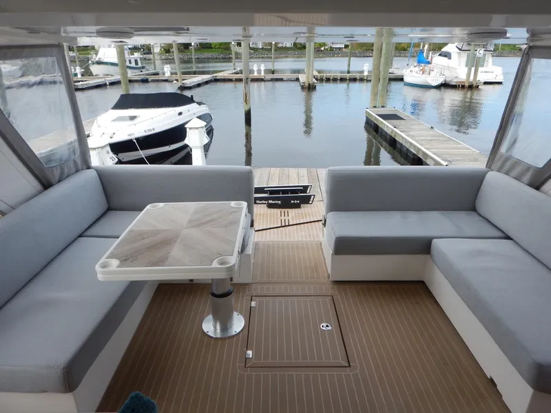 Slide: The Image of Sealine S450 2012 yacht with cozy cockpit and harbor view. - 11