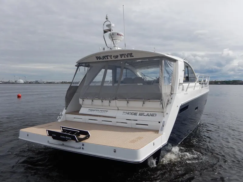 Slide: The Image of 2012 Sealine S450 yacht cruising on calm waters. - 4