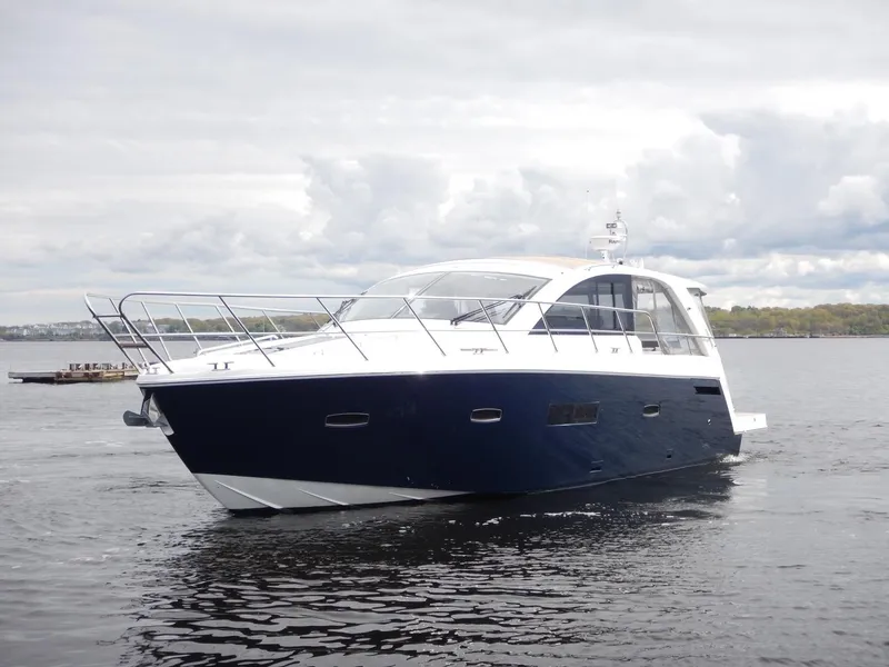 Slide: The Image of 2012 Sealine S450 yacht on calm waters. - 5