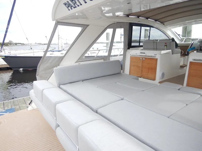 Slide: The Image of 2012 Sealine S450 yacht with spacious deck and luxurious interior. - 7
