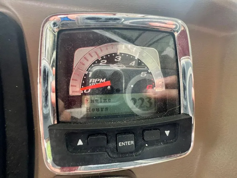 Slide: The Image of Close-up of 2013 Chaparral 244 Sunesta RPM gauge and engine hours display. - 20
