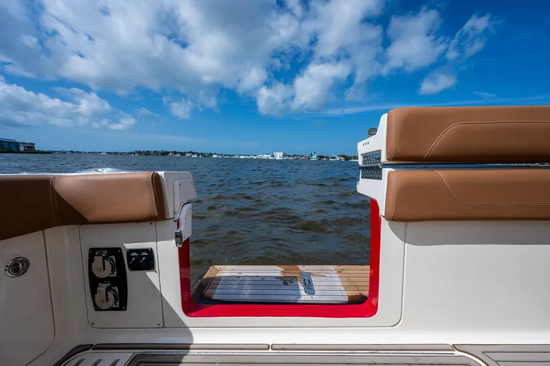 Slide: The Image of View from a 2017 Scout 420 LXF boat over the water. - 44