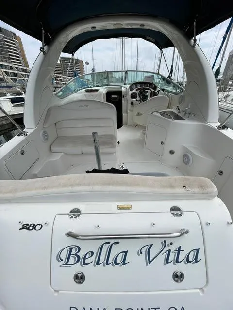 Slide: The Image of 2004 Sea Ray 280 Sundancer Bella Vita docked at marina. - 10