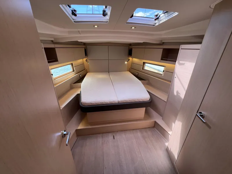 Slide: The Image of Luxurious cabin interior of 2020 Beneteau Oceanis 46.1 yacht with skylights and modern design. - 22