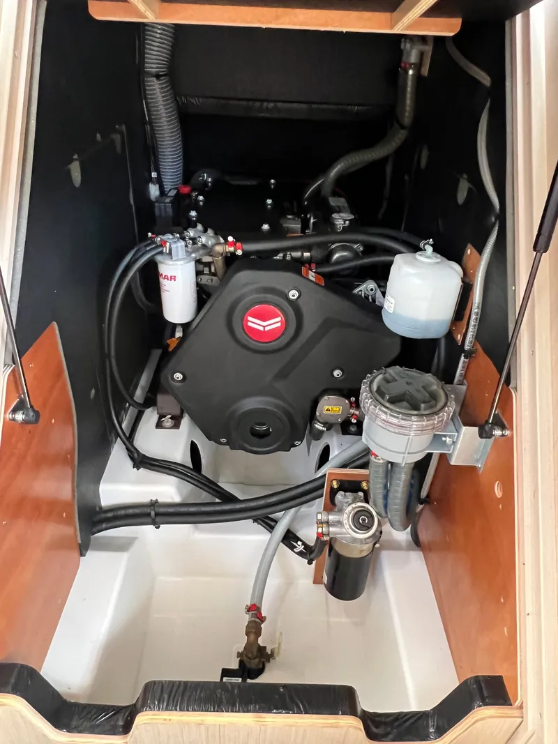 Slide: The Image of Engine compartment of 2020 Beneteau Oceanis 46.1 sailboat, showcasing mechanical components. - 26