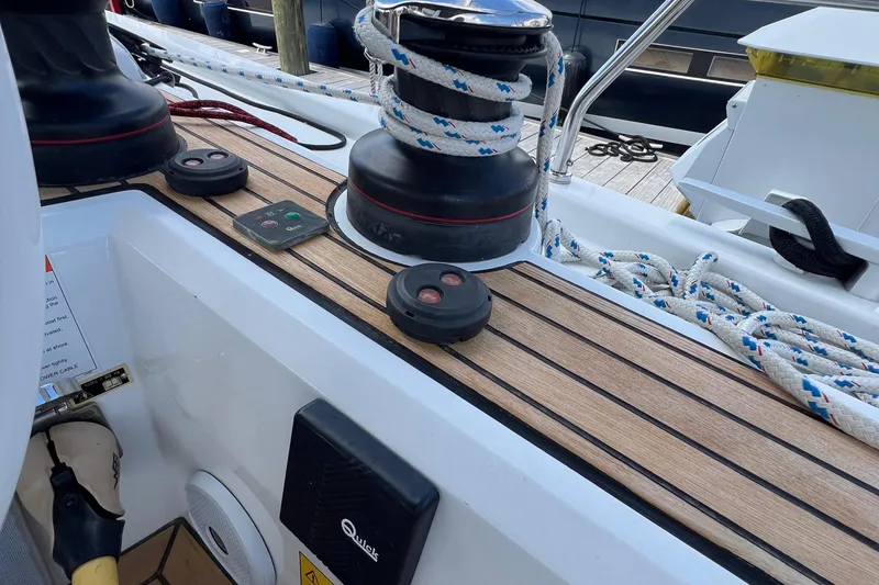 Slide: The Image of Deck of 2020 Beneteau Oceanis 46.1 sailboat with winches and ropes. - 35
