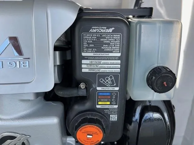 Slide: The Image of Close-up of a 2025 Formula 290 Bowrider Mercury engine component. - 13