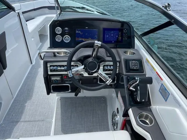 Slide: The Image of 2025 Formula 290 Bowrider cockpit with modern controls and dual displays. - 8