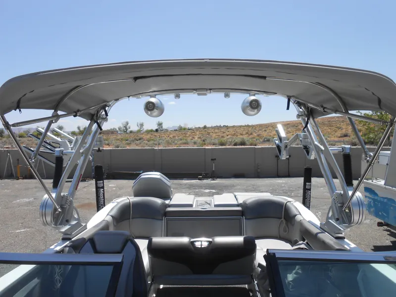 Slide: The Image of 2016 MasterCraft X23 boat with wakeboard tower and speakers. - 12