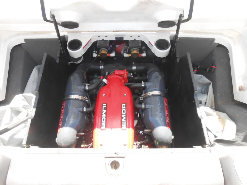 Slide: The Image of 2016 MasterCraft X23 boat engine compartment with Ilmor engine. - 13