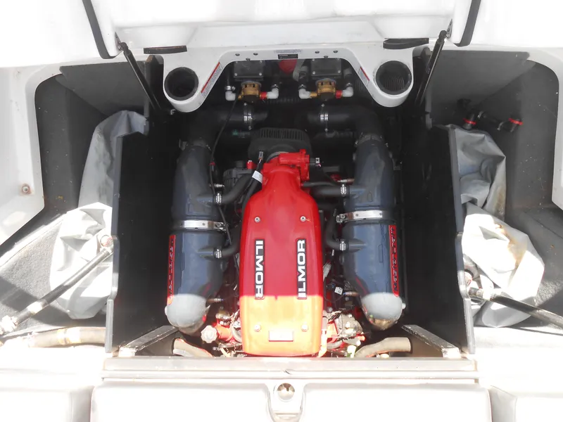 Slide: The Image of 2016 MasterCraft X23 boat engine compartment with Ilmor engine. - 14