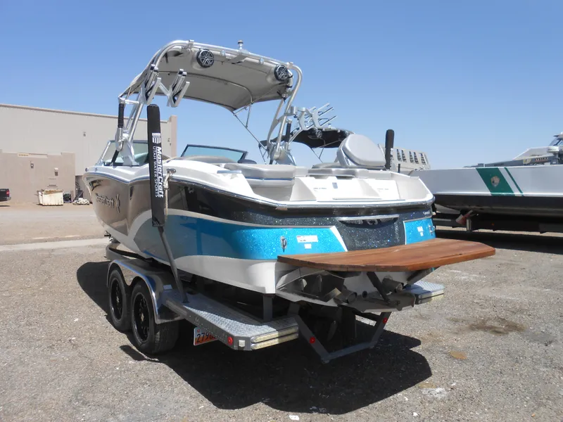 Slide: The Image of 2016 MasterCraft X23 boat on trailer, rear view. - 2