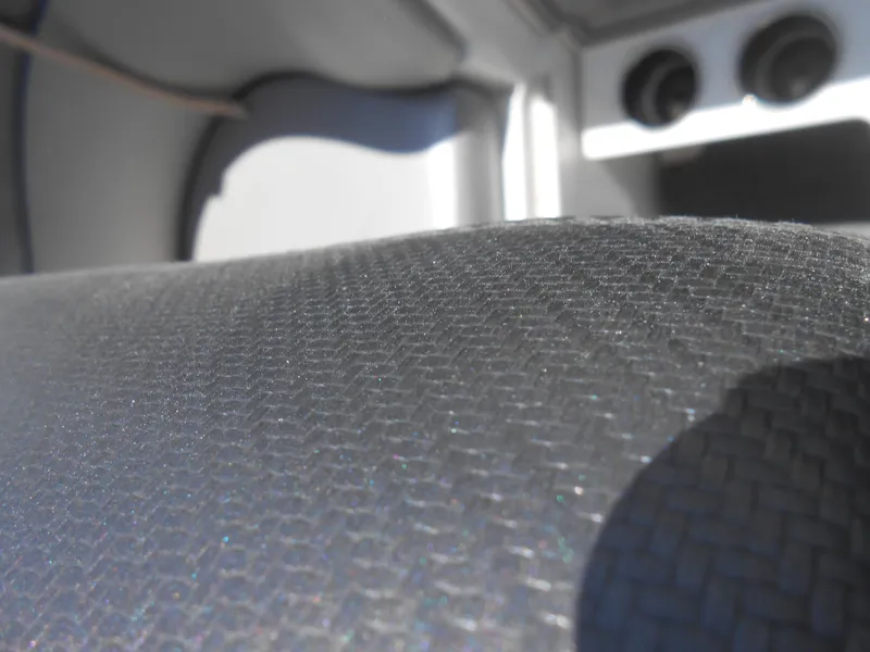 Slide: The Image of Close-up of 2016 MasterCraft X23 boat interior upholstery. - 6