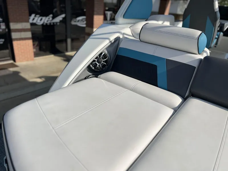 Slide: The Image of 2024 Trifecta 25 SPORT RL9 DC 3PLUS ARCH boat interior with luxurious seating and speaker. - 21