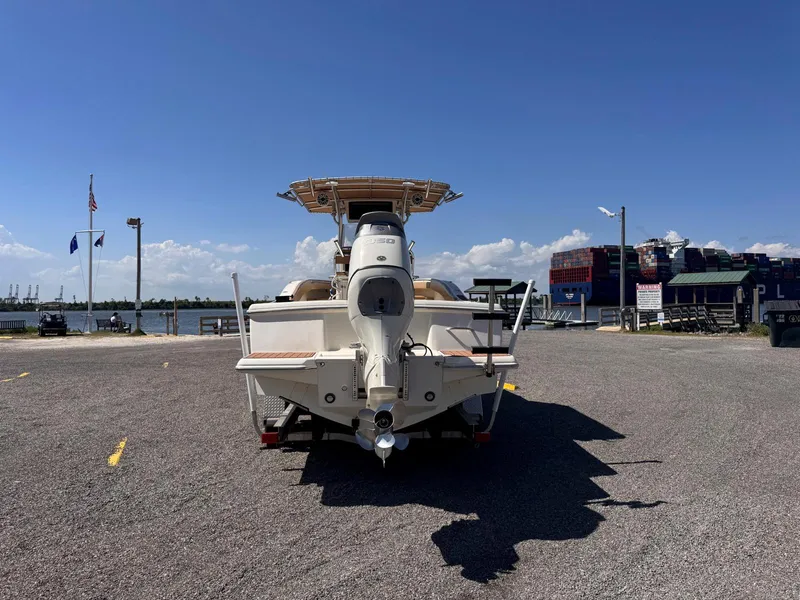 Slide: The Image of 2002 Scout 280 Sportfish boat at a marina on a sunny day. - 6