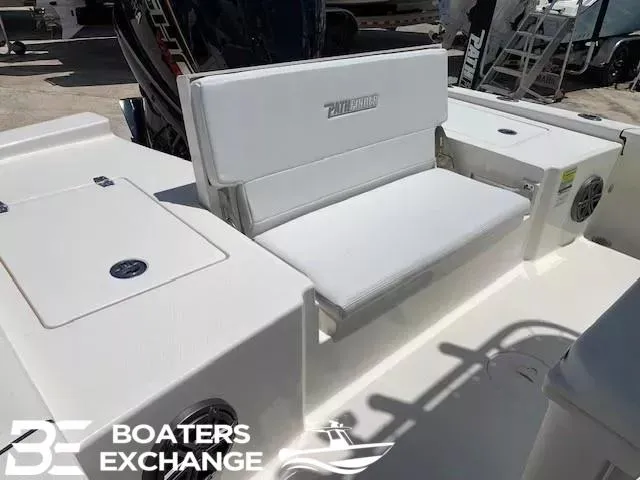 Slide: The Image of 2024 Pathfinder TRS 2200 boat interior with white seating, Boaters Exchange logo visible. - 4
