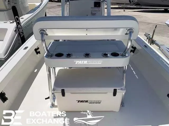 Slide: The Image of 2024 Pathfinder TRS 2200 boat interior with seating and storage, displayed at Boaters Exchange. - 5