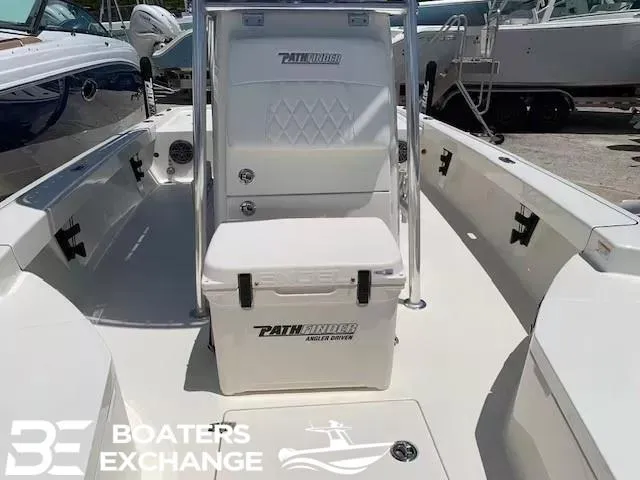 Slide: The Image of 2024 Pathfinder TRS 2200 boat interior with seating and storage, displayed at Boaters Exchange. - 8