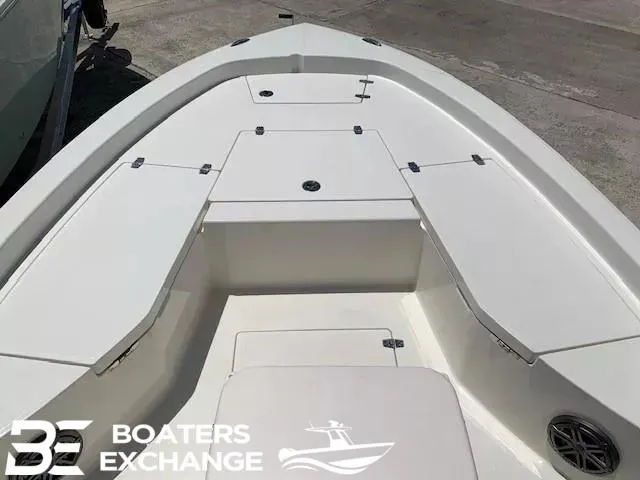 Slide: The Image of 2024 Pathfinder TRS 2200 boat deck with storage compartments, showcased by Boaters Exchange. - 9