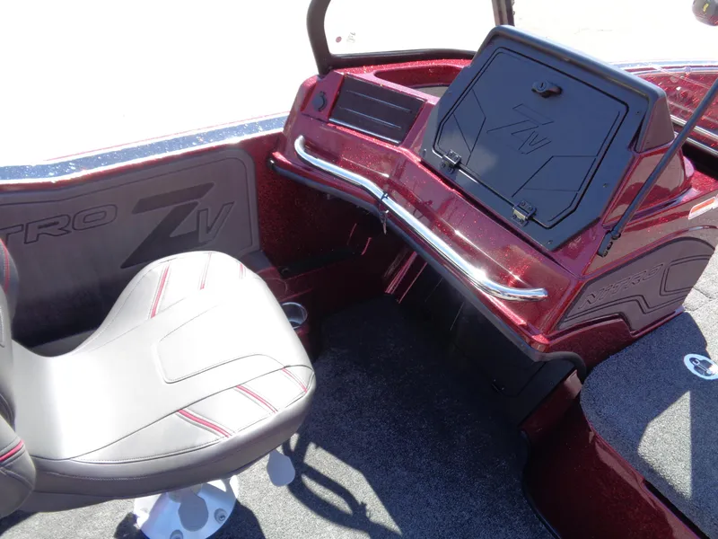 Slide: The Image of 2024 Nitro ZV20 boat interior with seating and dashboard. - 13
