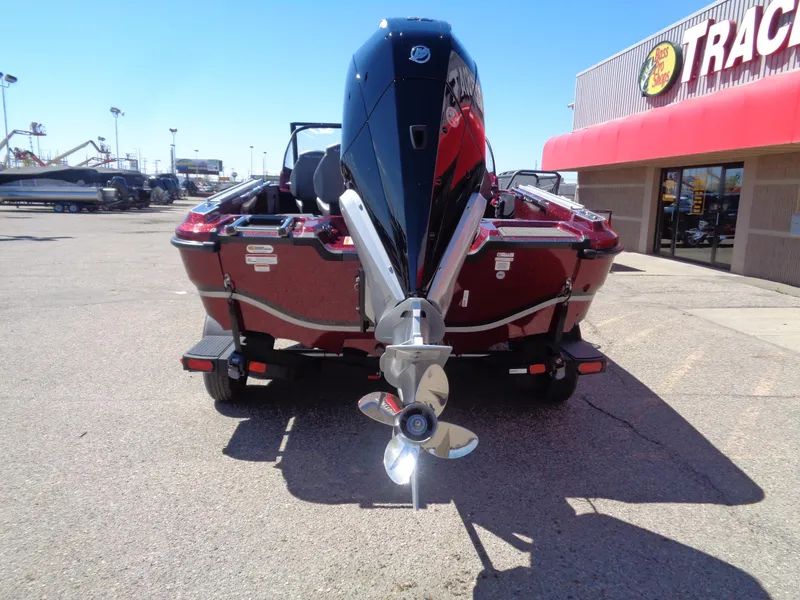 Slide: The Image of 2024 Nitro ZV20 boat with outboard motor at dealership. - 3