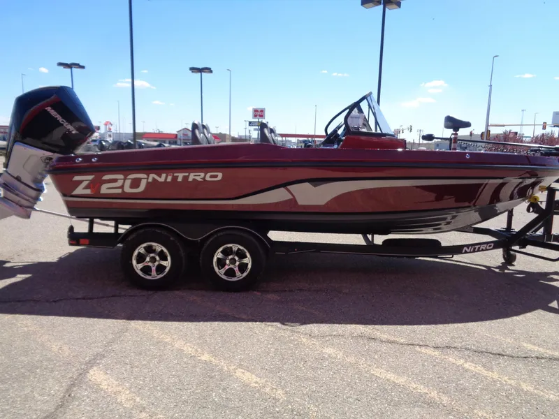 Slide: The Image of 2024 Nitro ZV20 boat on trailer in parking lot. - 5