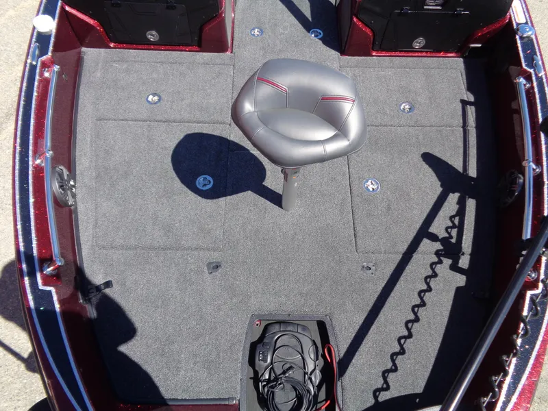 Slide: The Image of 2024 Nitro ZV20 boat deck with a single seat and carpeted flooring. - 7
