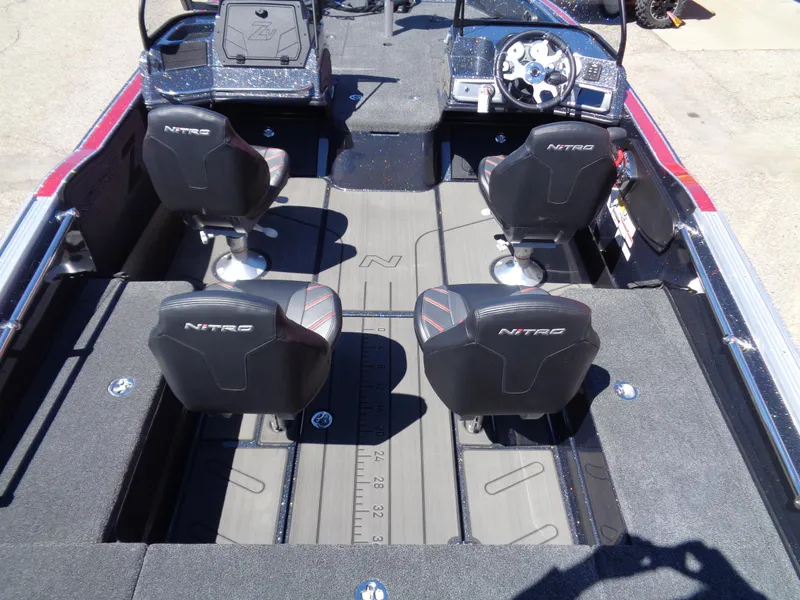 Slide: The Image of 2024 Nitro ZV20 boat interior with four seats and dual consoles. - 6
