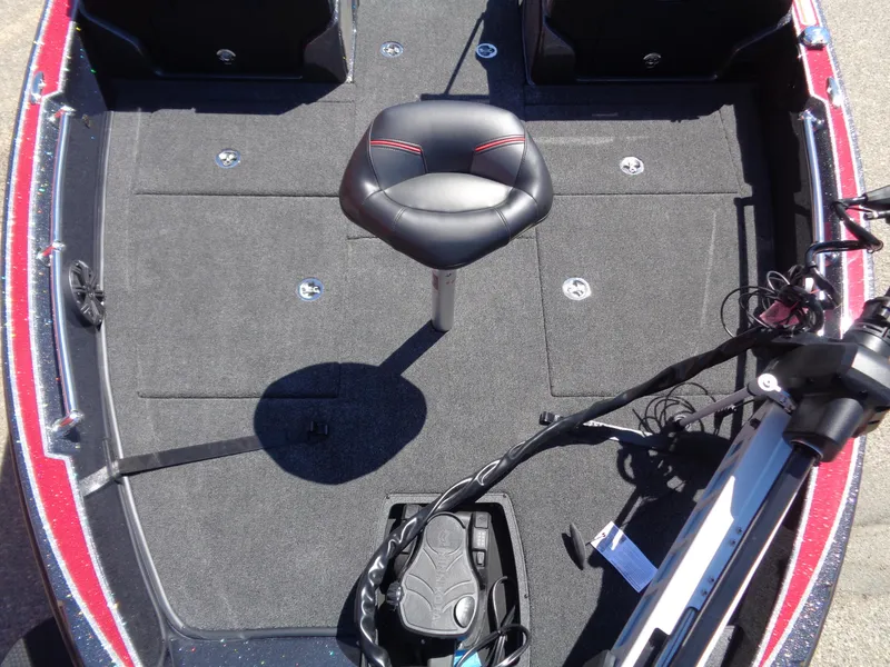 Slide: The Image of 2024 Nitro ZV20 boat interior with fishing seat and trolling motor. - 9