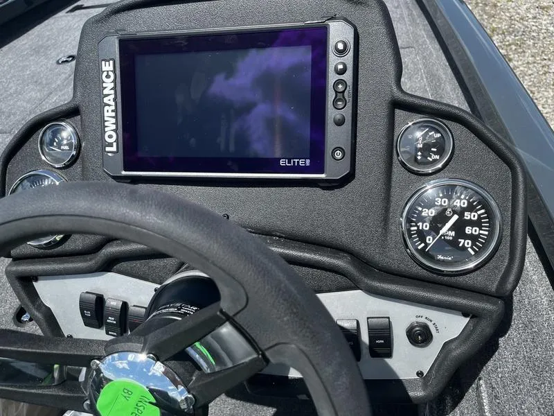 Slide: The Image of 2024 Ranger RT188P boat dashboard with Lowrance Elite fishfinder and gauges. - 5