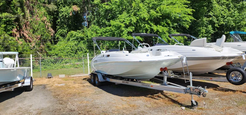 The Image of 2023 Sea Pro Citation 2100 boats on trailers in outdoor storage. - 1