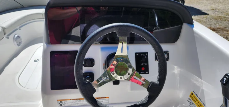 Slide: The Image of Steering wheel and dashboard of 2023 Sea Pro Citation 2100 boat. - 3