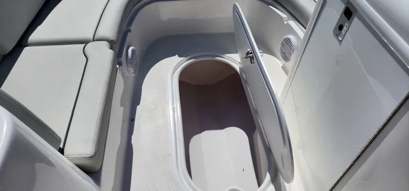 Slide: The Image of 2023 Sea Pro Citation 2100 boat storage compartment with open hatch. - 7