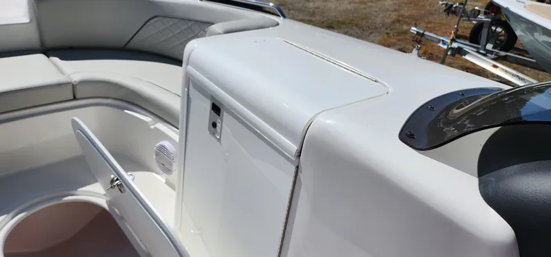 Slide: The Image of 2023 Sea Pro Citation 2100 boat interior with storage compartment and seating. - 8