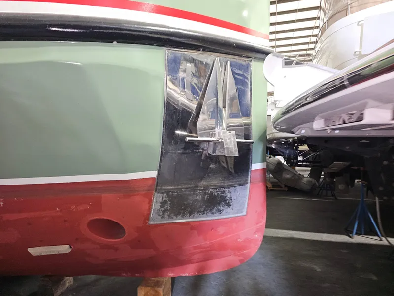 Slide: The Image of Kitchen interior of 1999 Florida Bay Coaster 42 with white appliances and wooden cabinets. - 29