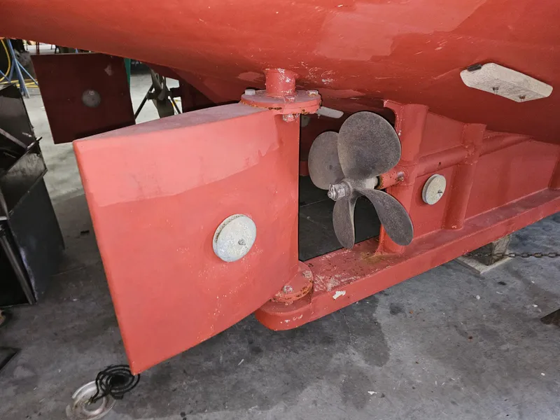 Slide: The Image of Compact bathroom in 1999 Florida Bay Coaster 42 yacht with sink and toilet. - 30