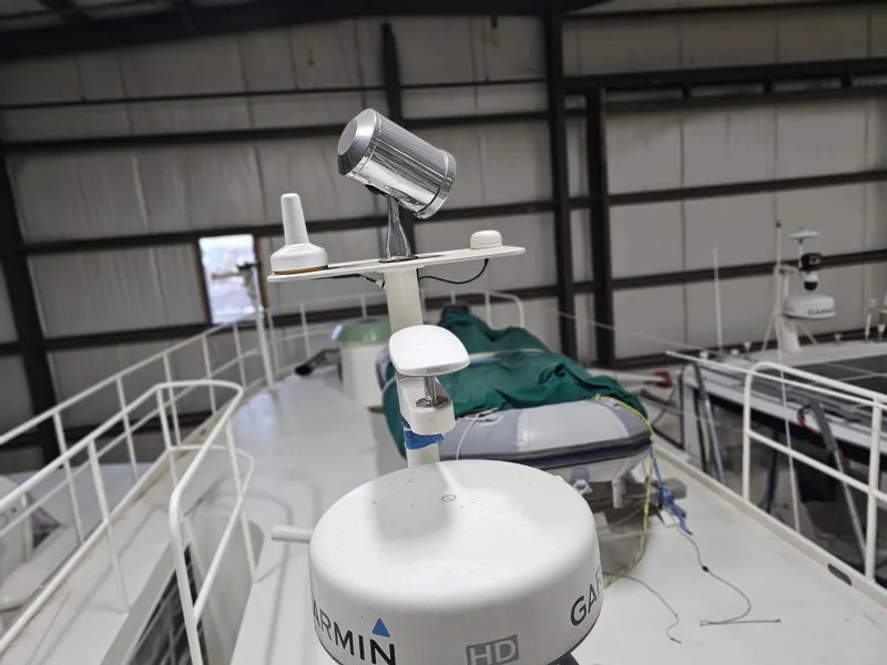 Slide: The Image of Wooden interior stairs on 1999 Florida Bay Coaster 42 boat. - 37