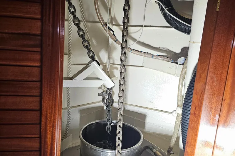 Slide: The Image of Anchor chain locker of 1999 Florida Bay Coaster 42 boat. - 47