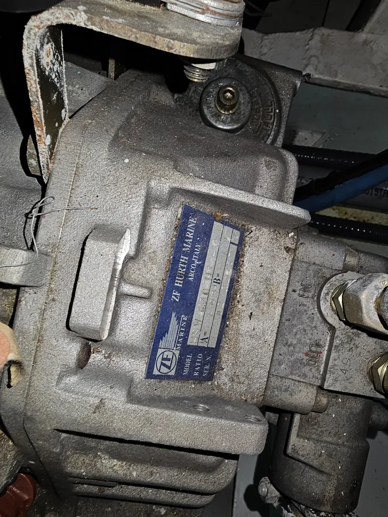 Slide: The Image of Close-up of a 1999 Florida Bay 42 Coaster engine component. - 58