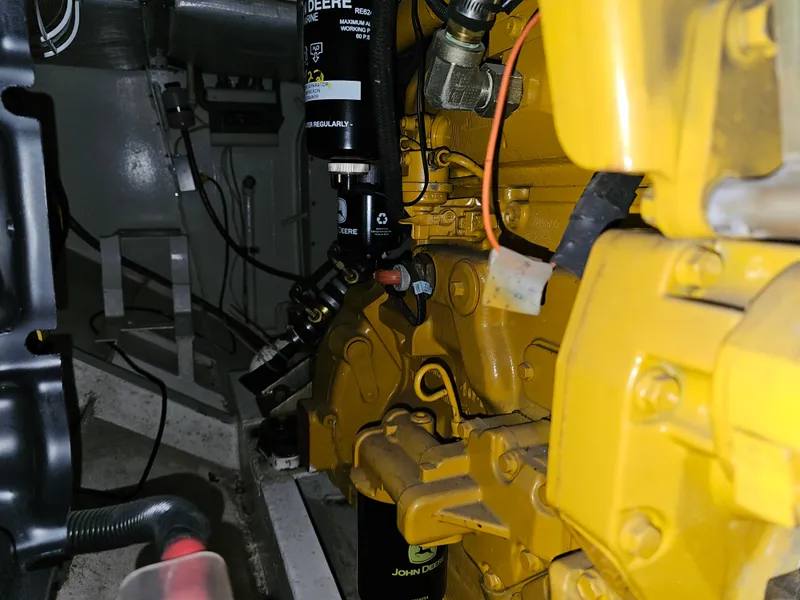 Slide: The Image of Engine compartment of a 1999 Florida Bay 42 Coaster boat. - 68