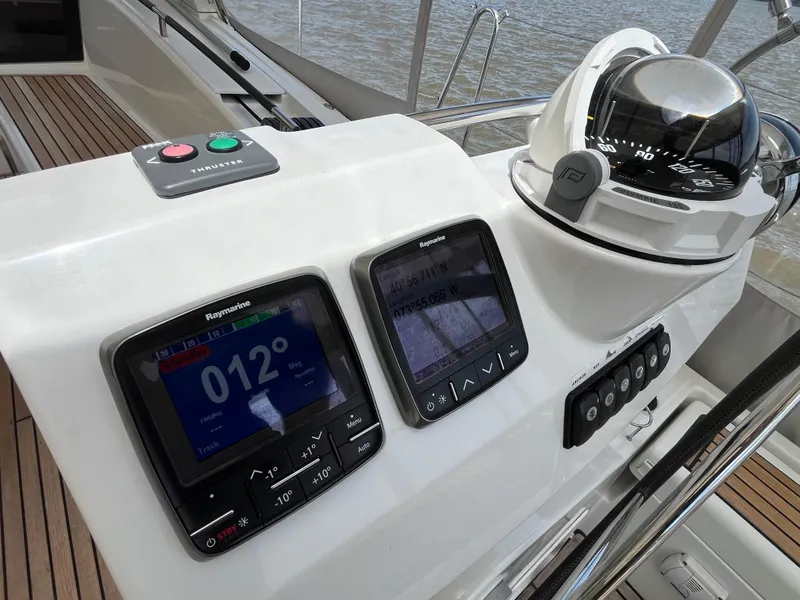 Slide: The Image of Control panel of a 2012 Beneteau Oceanis 58 yacht with navigation instruments. - 11
