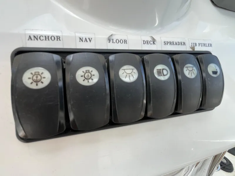 Slide: The Image of Control panel switches on a 2012 Beneteau Oceanis 58 yacht. - 14