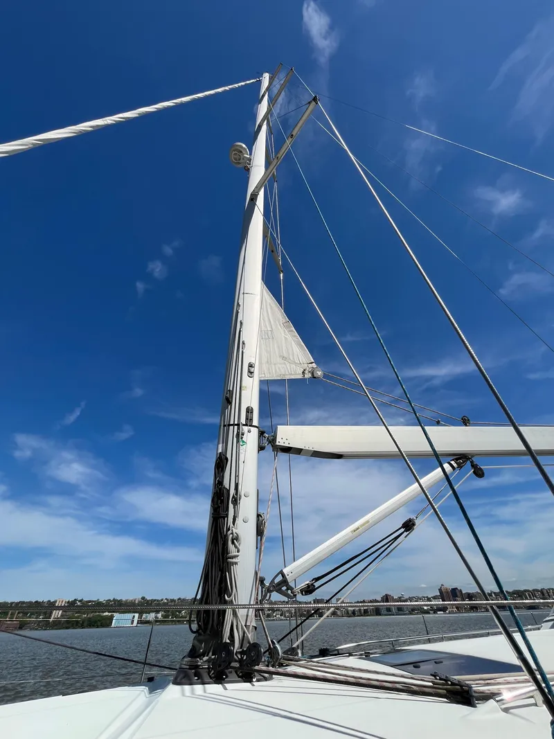 Slide: The Image of Sailboat mast of 2012 Beneteau Oceanis 58 against clear blue sky. - 37