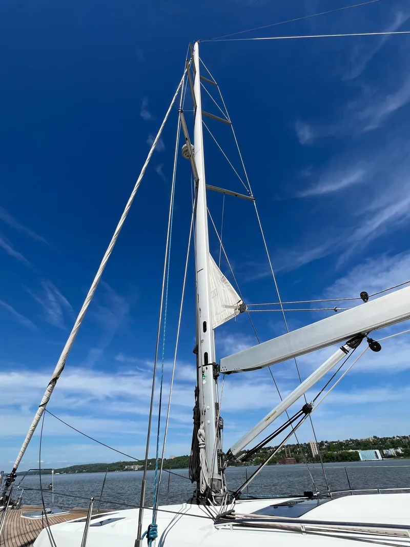 Slide: The Image of Sailboat mast of 2012 Beneteau Oceanis 58 against clear blue sky. - 38